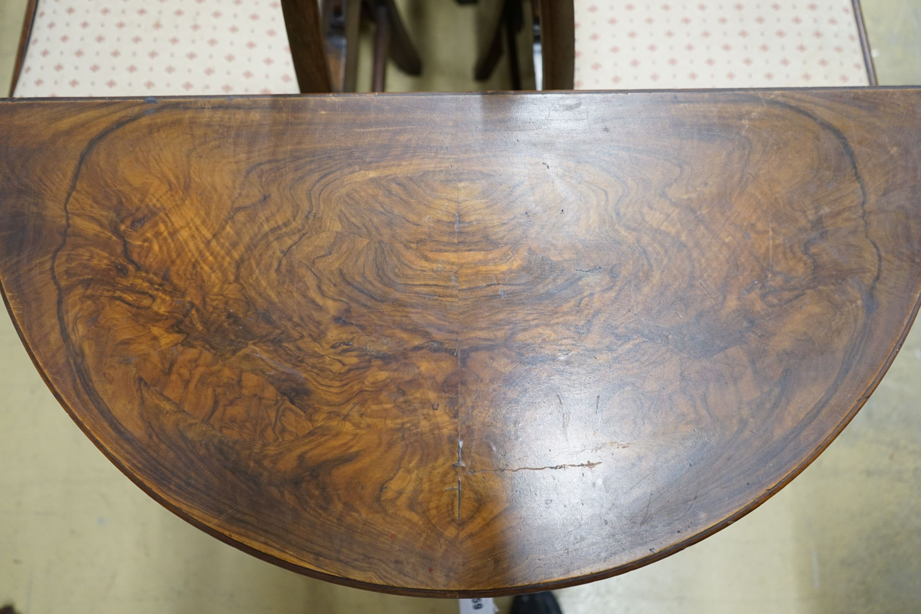 A Queen Anne revival walnut demi-lune folding card table, width 76cm, depth 38cm, height 76cm